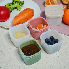 TOPGOMES silicone containers; steam-vented lids prevent splatters during reheating.