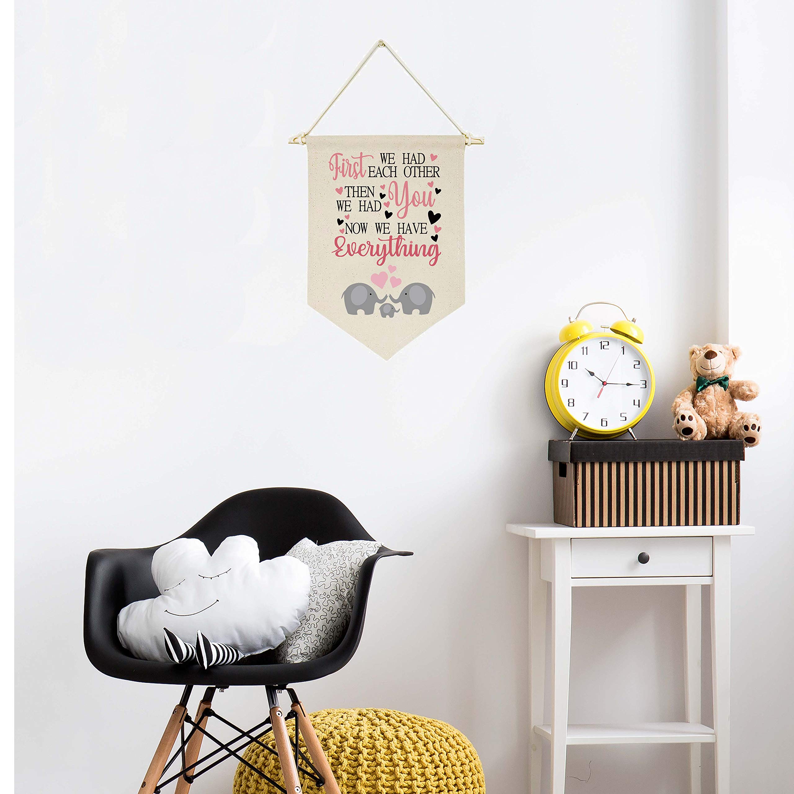 Topthink nursery wall decor banner adds warm, minimalist touch.