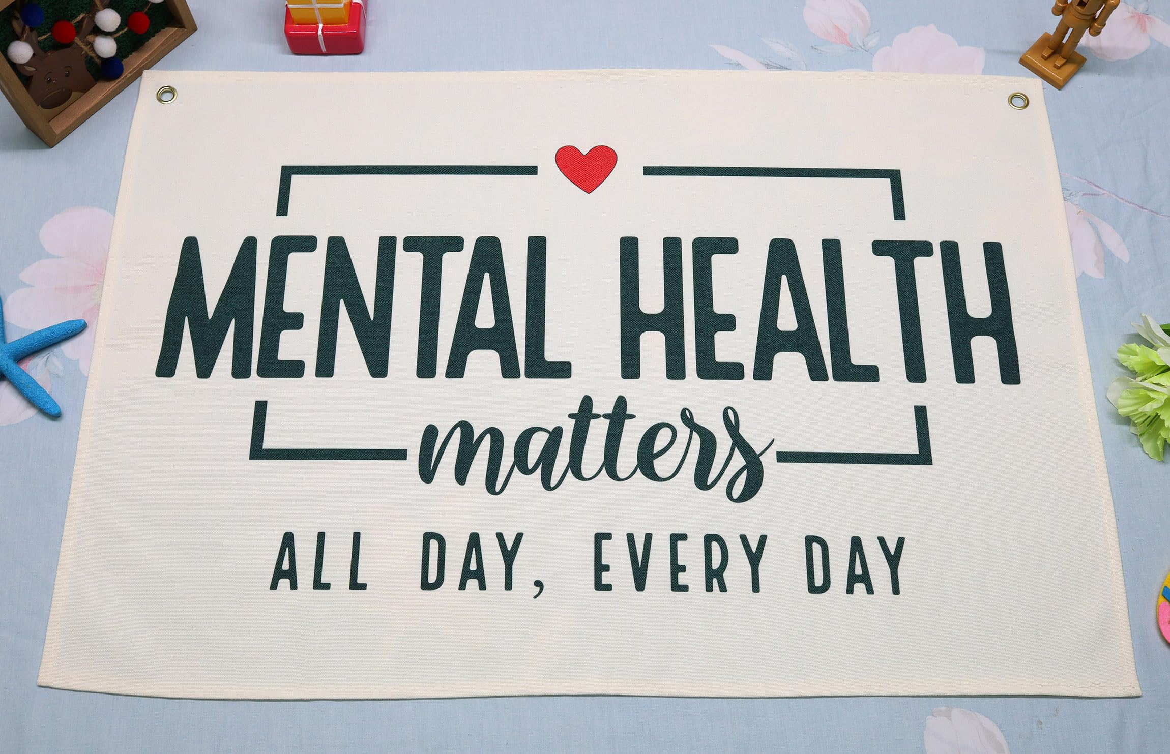 Topthink mental health banner on beige wall adds gentle inspiration for kids.