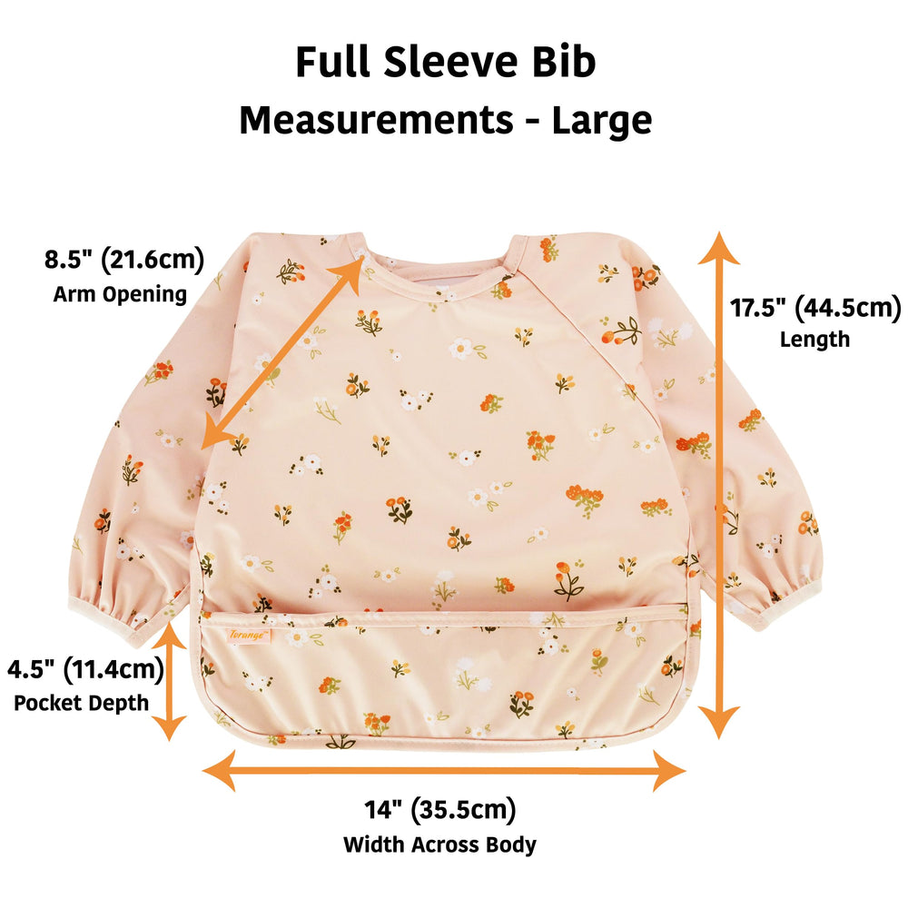 Torange baby wears a BLW-ready bib for comfortable feeding sessions