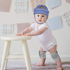 TORASO baby helmet with blue dots, side view highlighting lightweight design