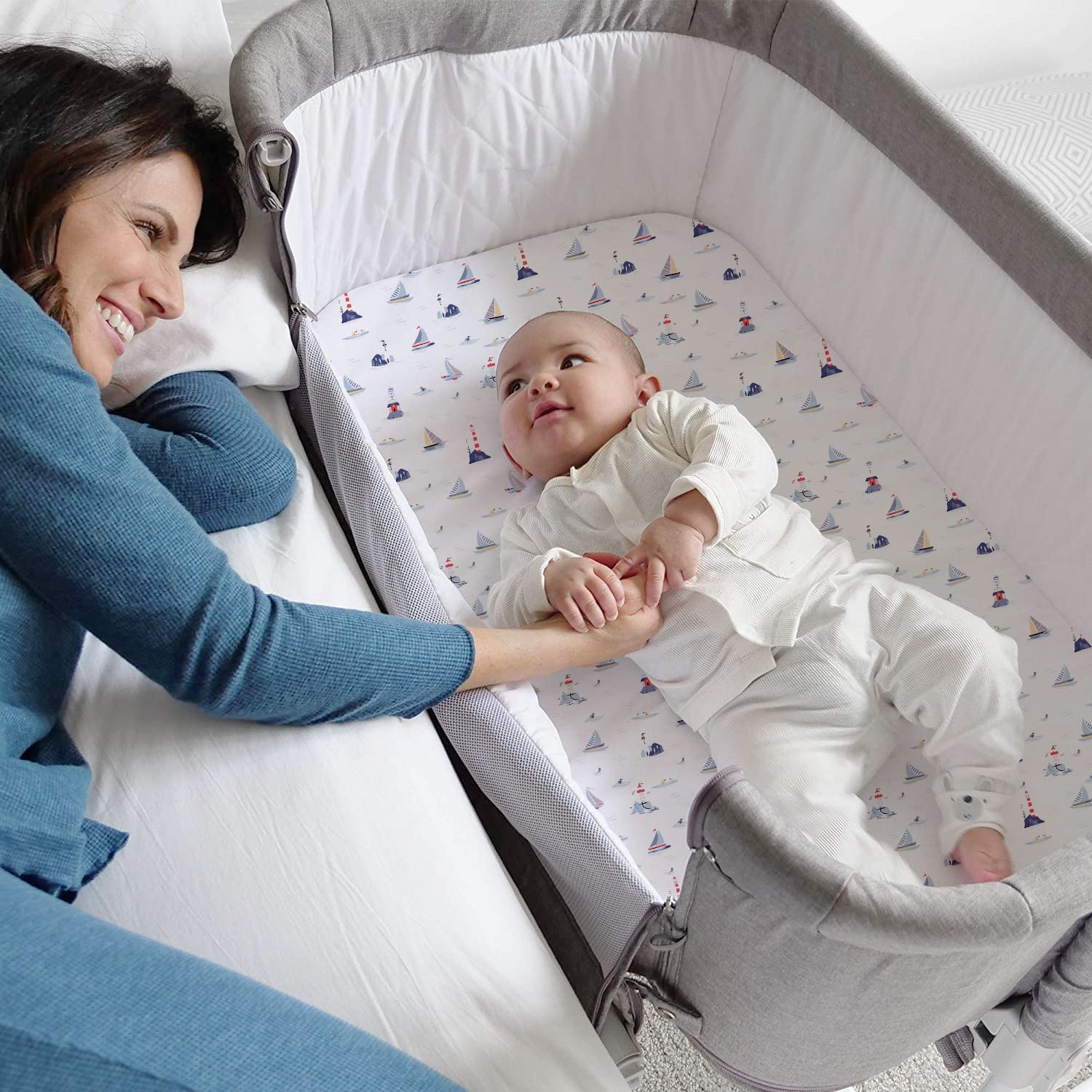 Air Balloon and Sailboat print adds gentle visual interest for baby.