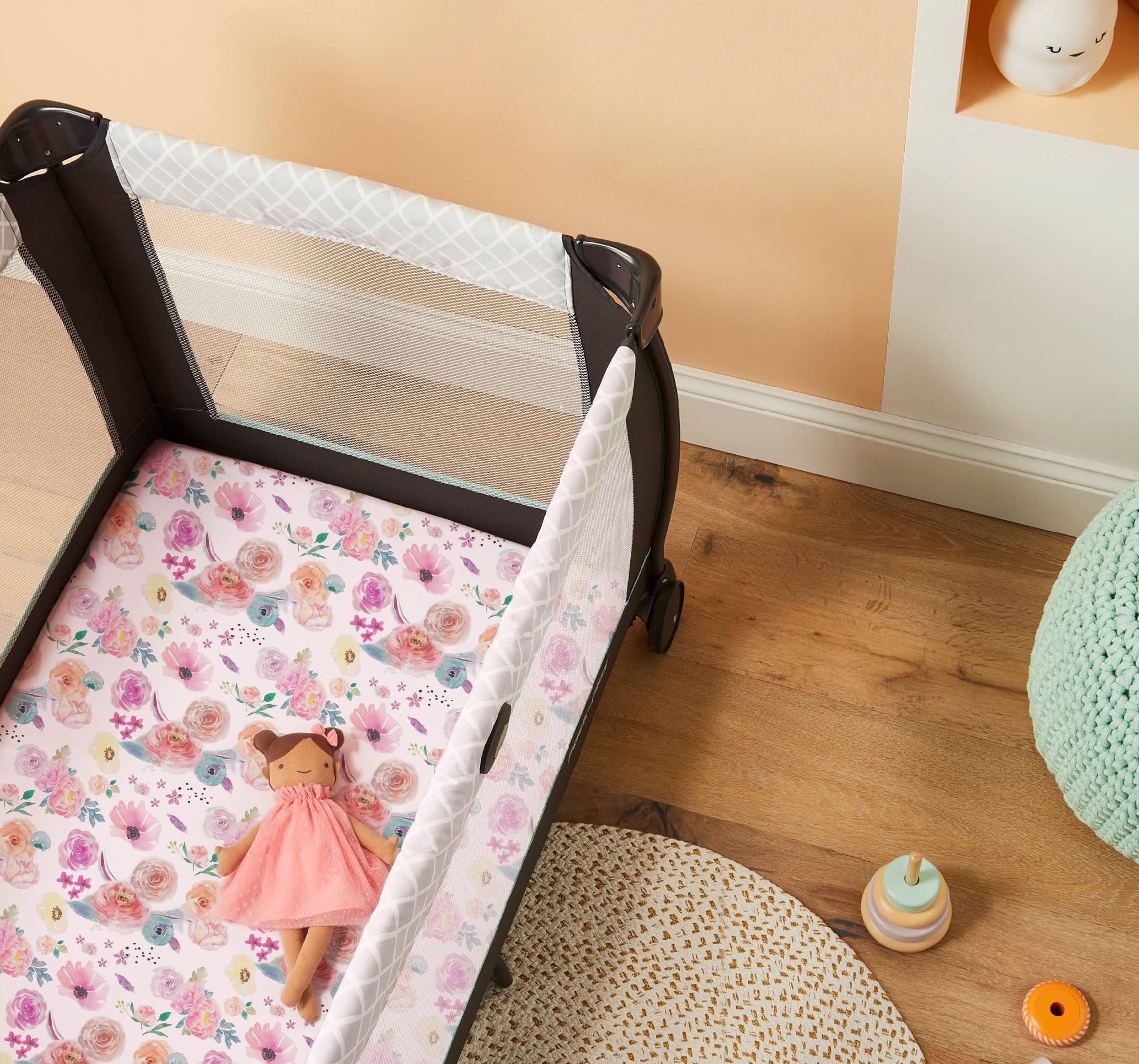 TotAha easy-care pack-n-play sheet simplifies laundry with quick wash and dry cycles.