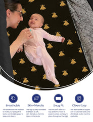 TotAha Mini Crib Sheet on mattress shows secure, snug fit for baby.