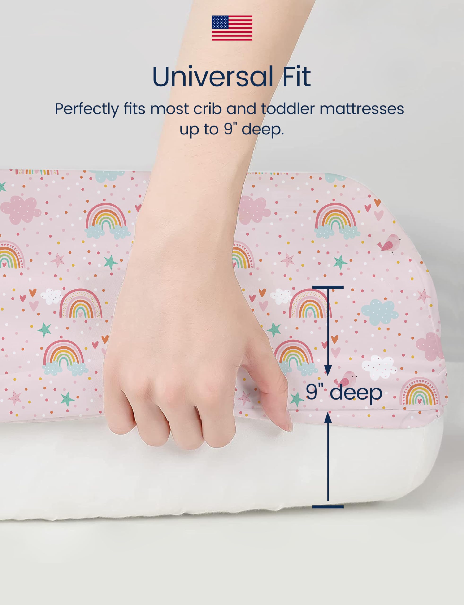 TotAha Pink Rainbow crib sheet enhances cozy nursery styling.