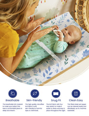 TotAha small floral design changing pad cover highlighting flexible stretch for snug fit.