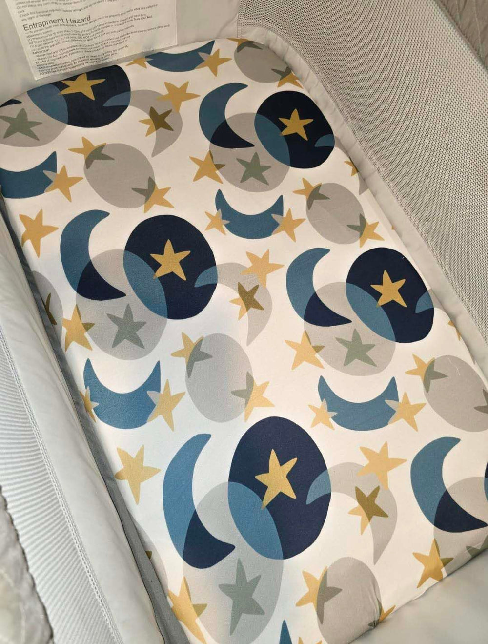 TotAha Space mini crib sheets fit snugly on playard mattress for Graco compatibility.