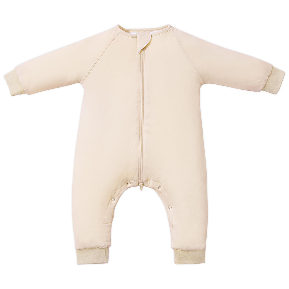 TOTBASIC baby sleep sack with feet in oat color showing foot openings for easy movement and warmth