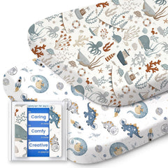 TotBASIC bassinet sheet with dino and whale pattern for gentle, cozy sleep in compatible bassinets.