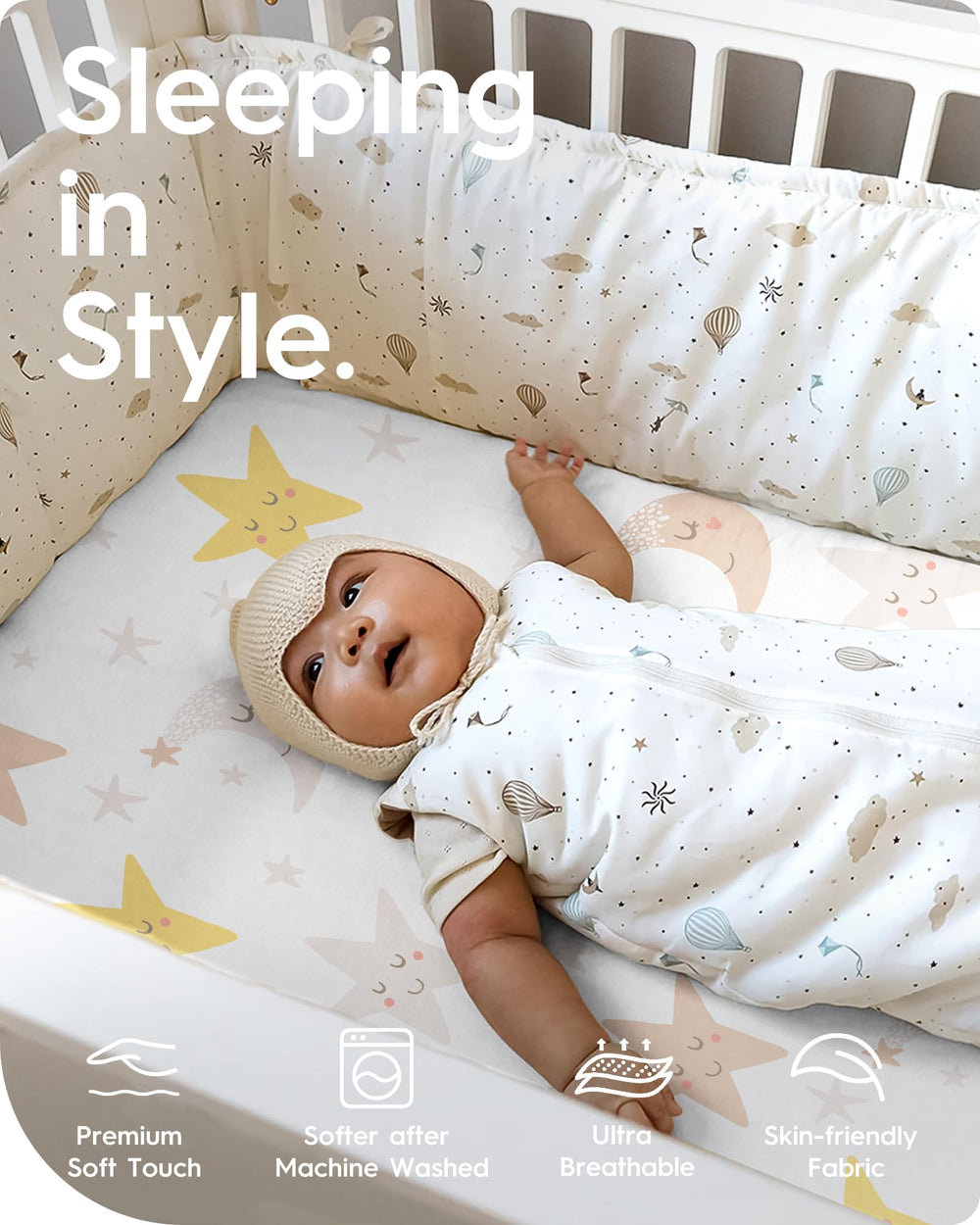 TotBasic planet-pattern sheet shows a secure elastic edge for a snug fit.