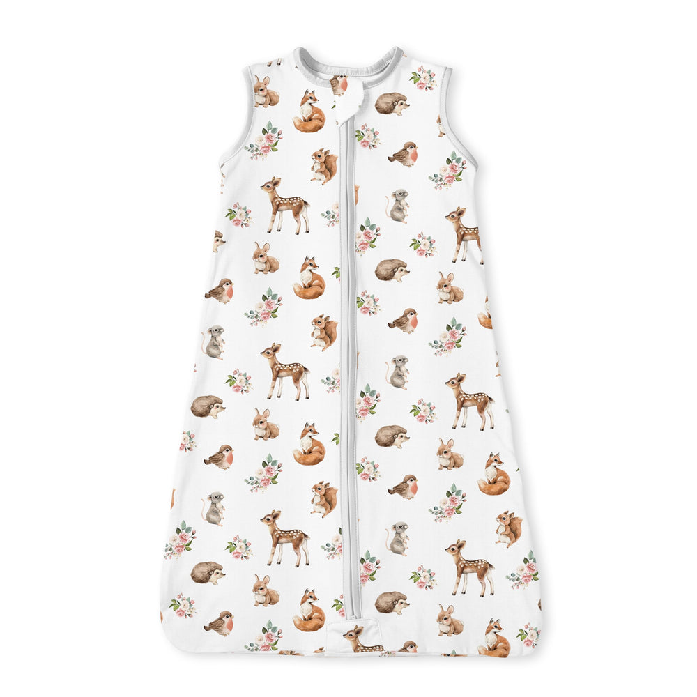 TOTBASIC Forest Whimsy sleep sack on bed showcasing cozy use.