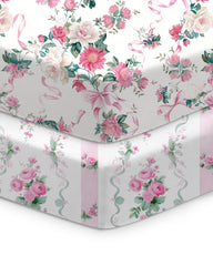 TotChill baby crib sheet with pink roses pattern fits standard crib mattresses snugly.