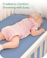 TotChill elastic-edge crib sheet provides secure, easy-to-change fit for parents.