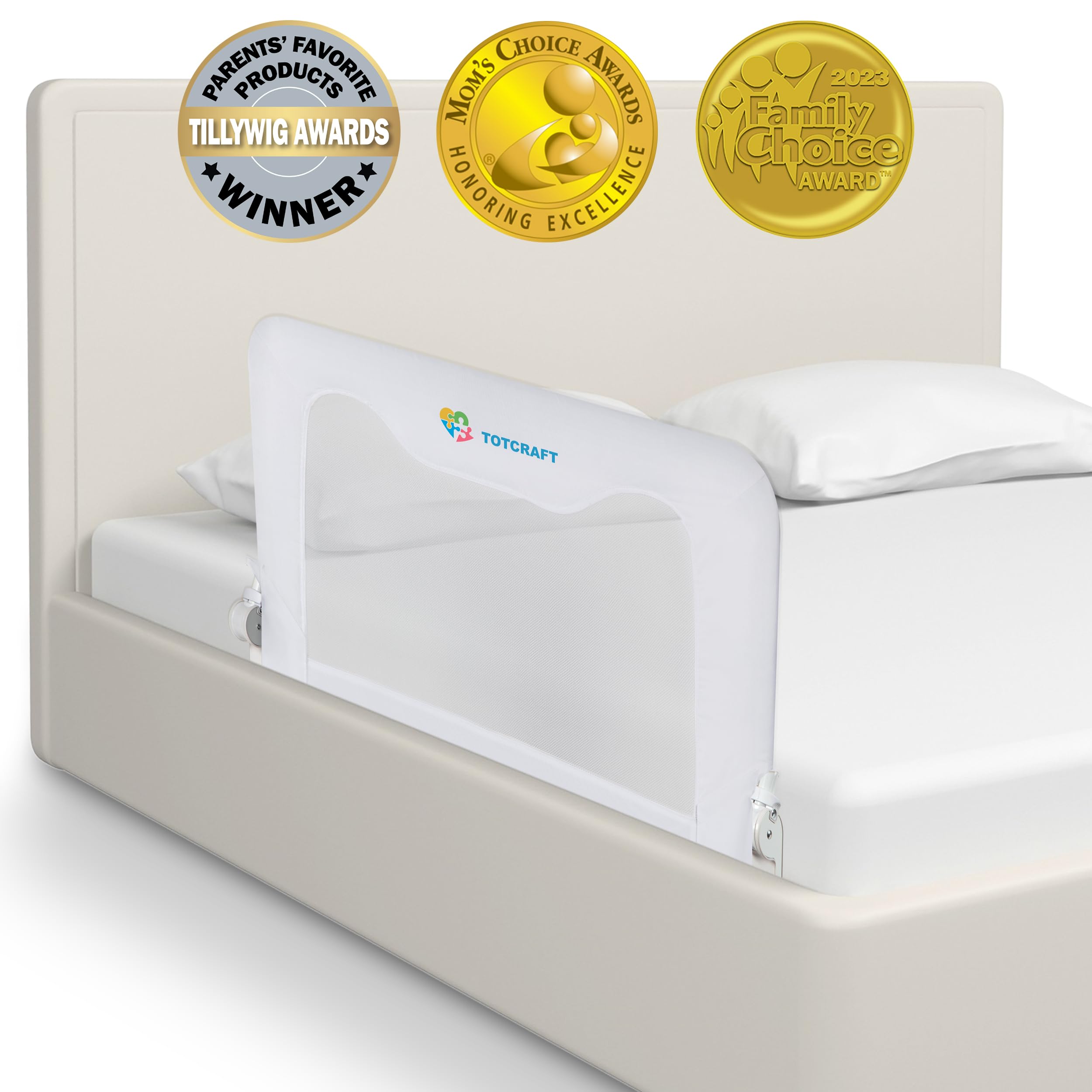 TotCraft white finish bed rail installed on a toddler bed.