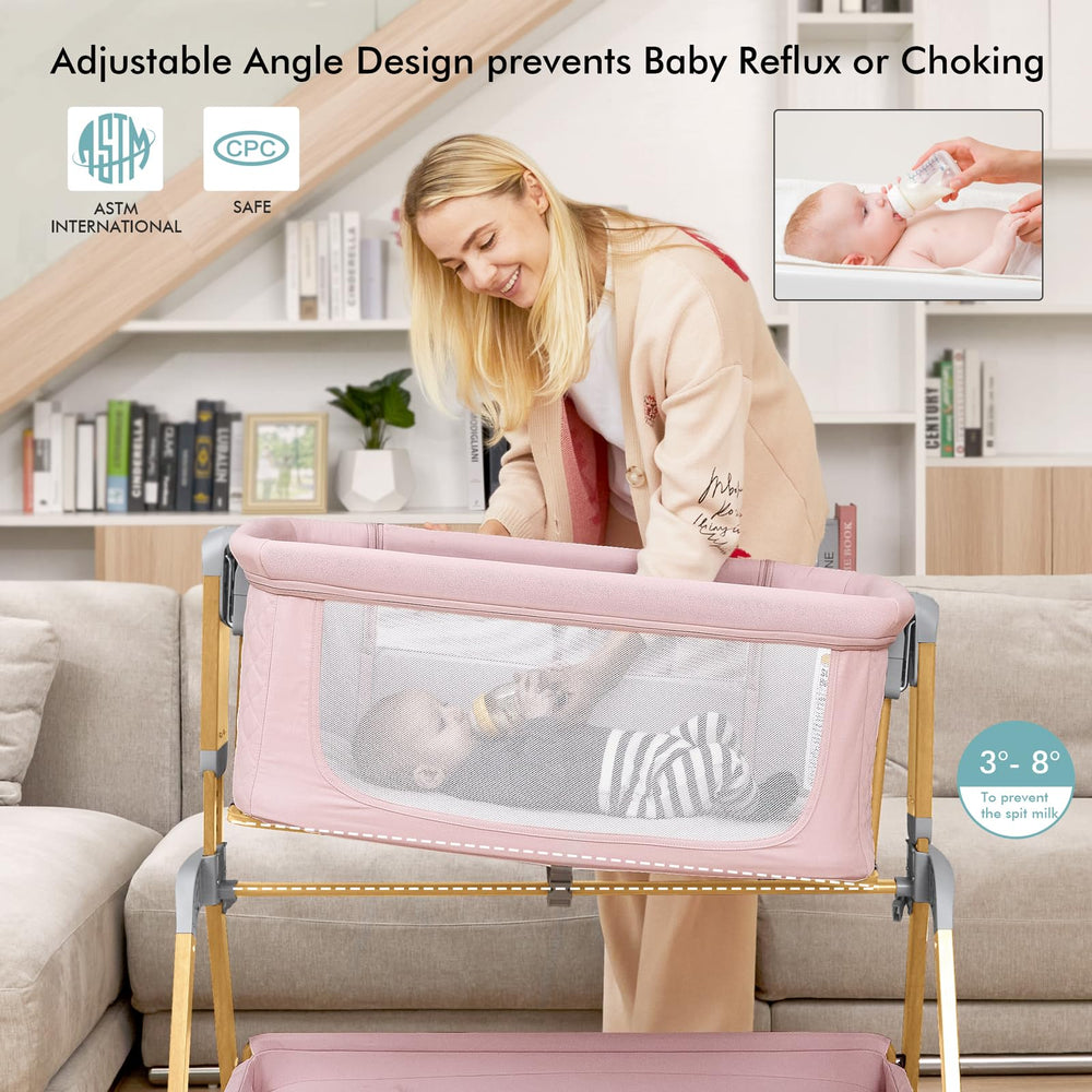 TotRun Bassinet pink baby-nest offers a snug, breathable sleeping space.