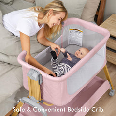 TotRun Bassinet bedside sleeper pink bed-attachment demonstrates secure night feeds.