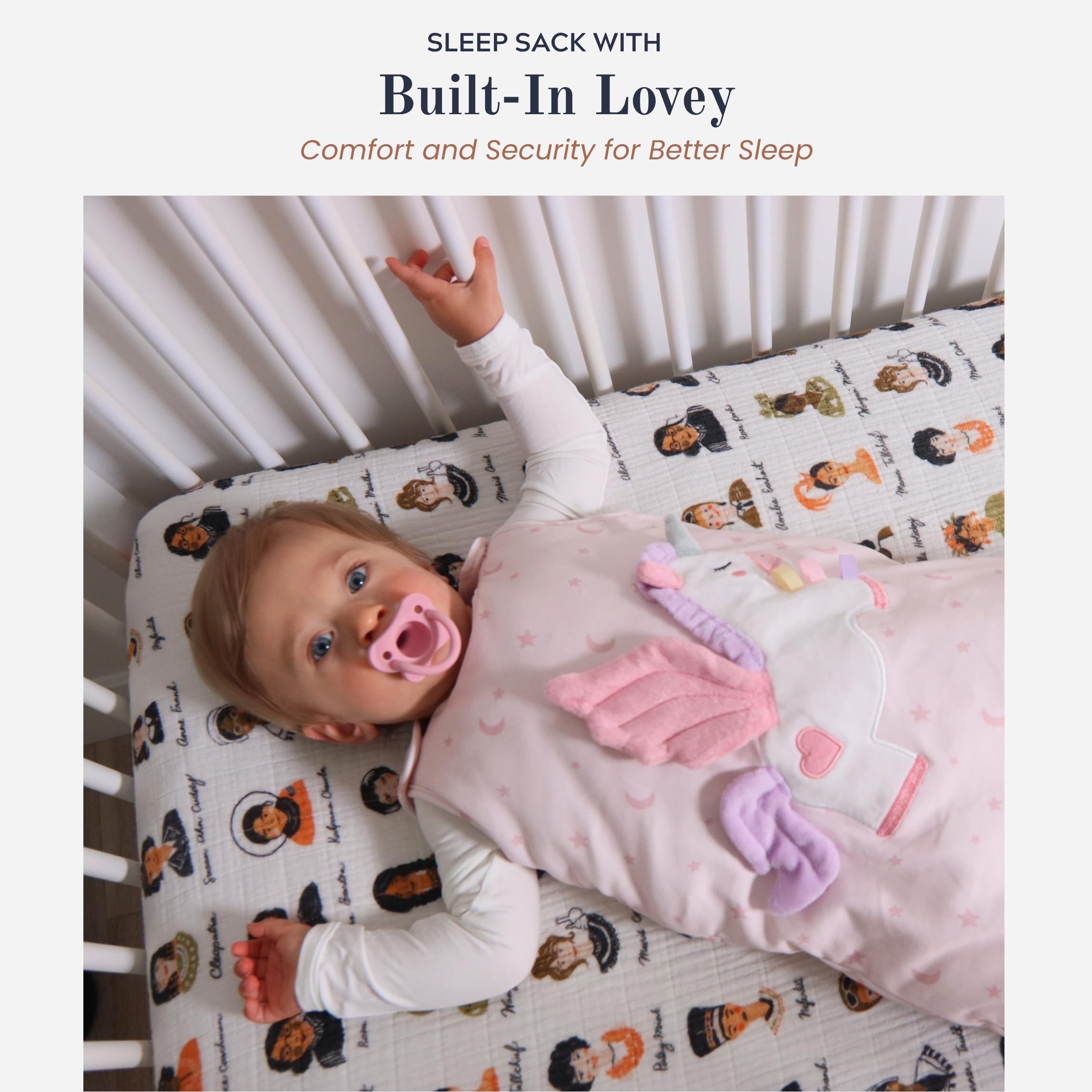 Toucan Baby Unicorn sleep sack worn by baby, chest-level lovey within reach.