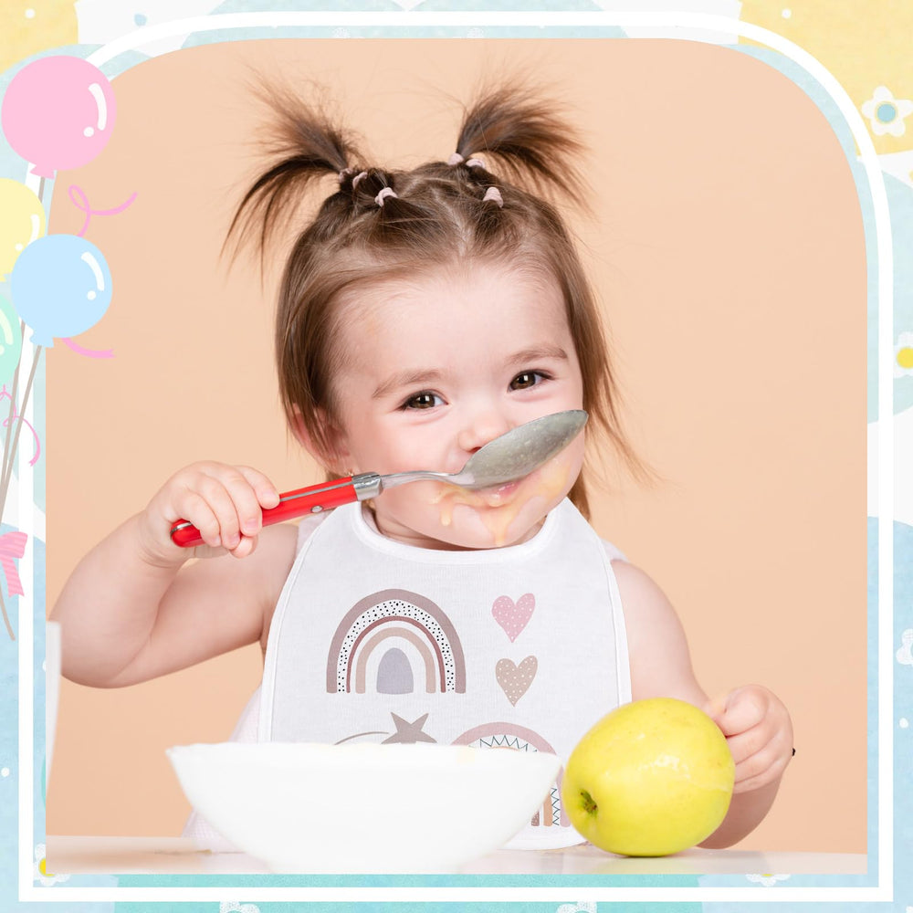 Toulite absorbent and reversible bibs keep outfits clean and flexible.