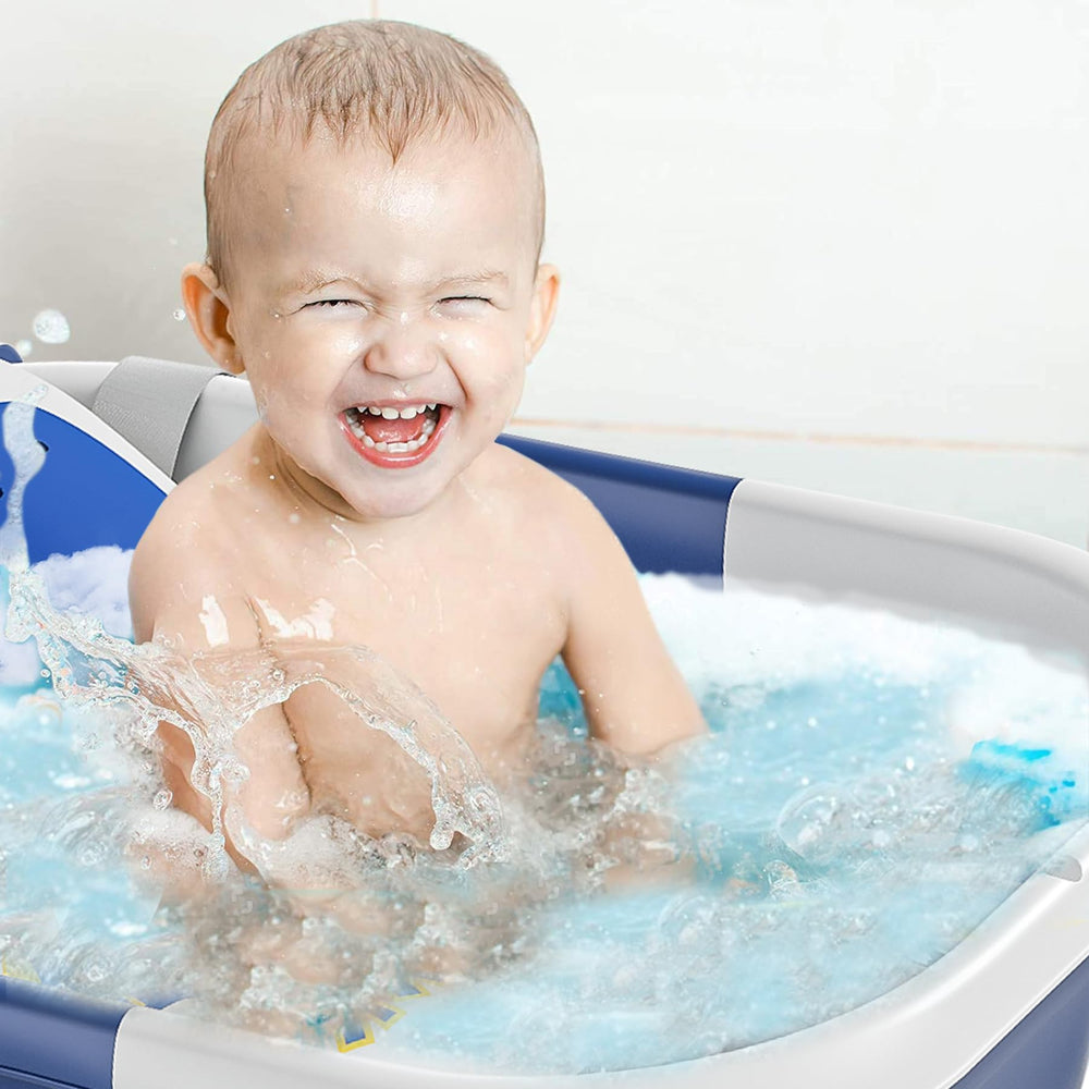 TPN baby bath tub wall grooves for hanging storage and easy access.