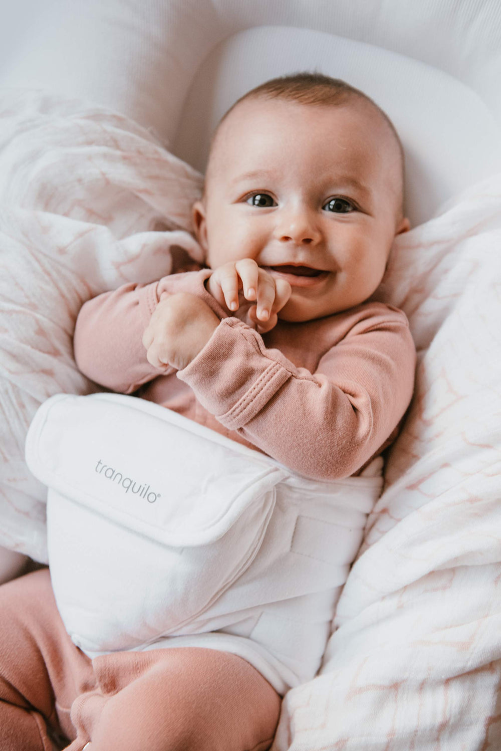 Tranquilo Baby Soothe three massagers illustrate gentle rotating massage for fussiness.