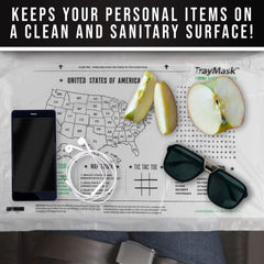 TrayMask on airplane tray table ready for meals and activities during flight