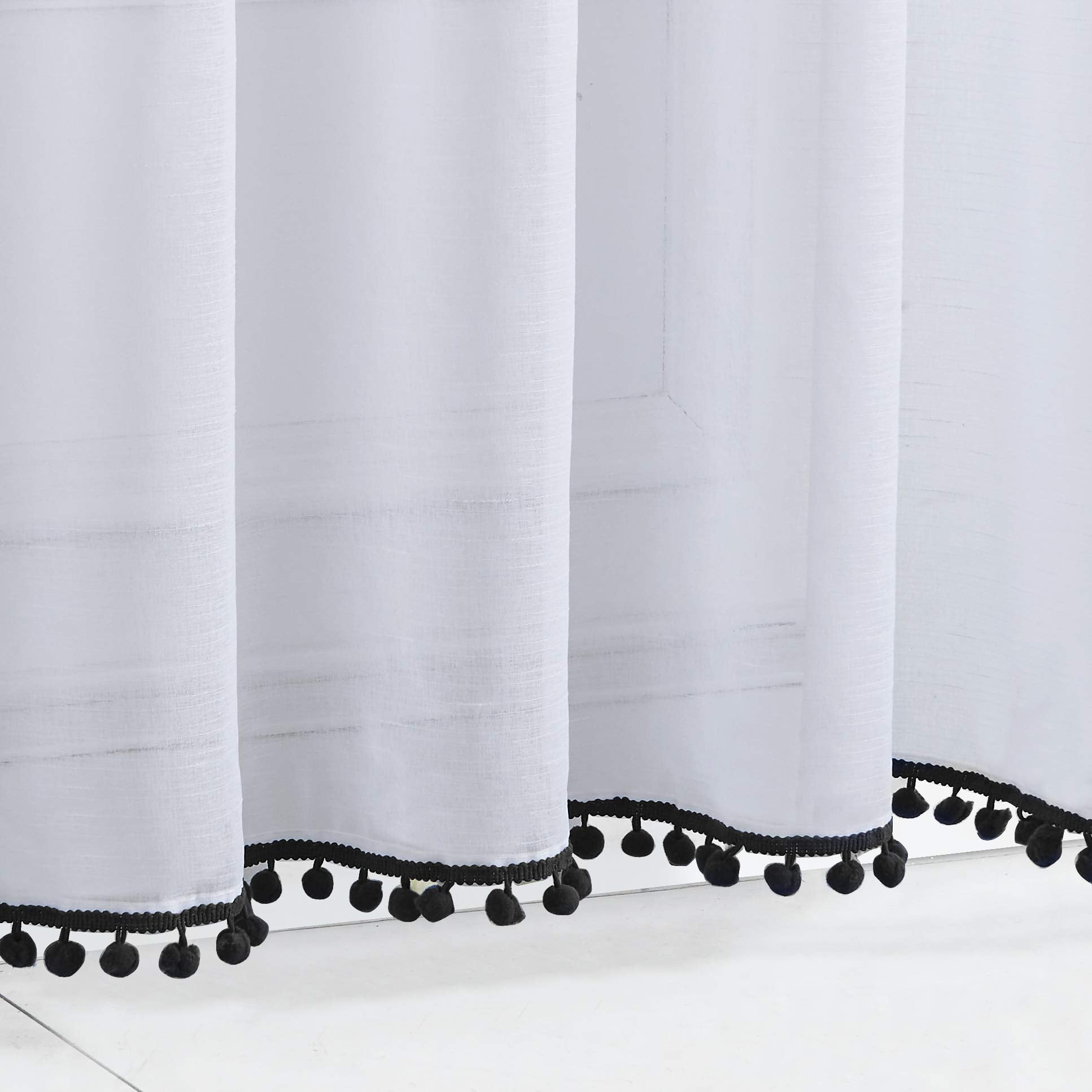 Treatmentex linen texture sheer fabric provides soft diffusion of daylight.