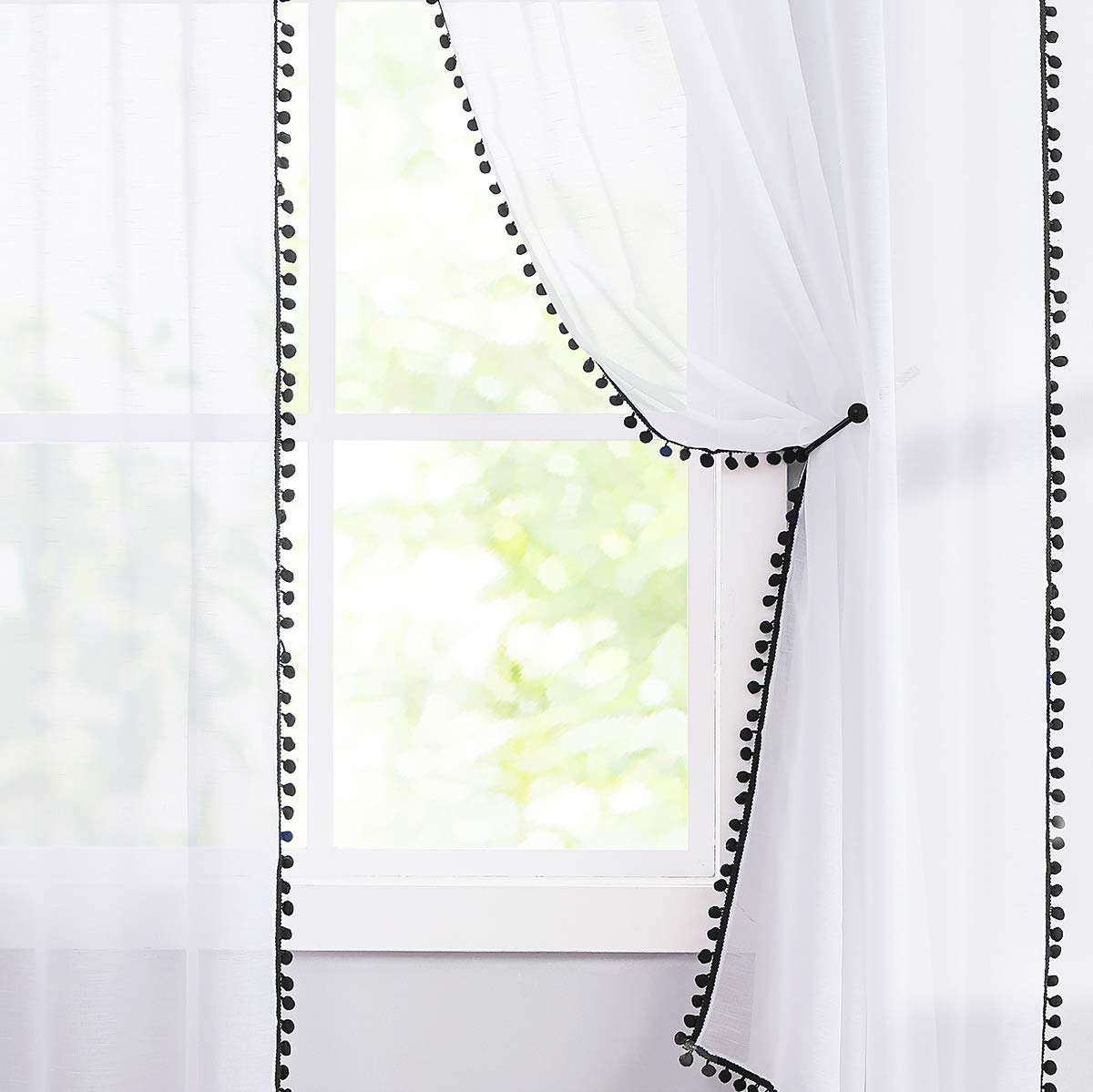 Treatmentex nursery room curtains diffuse light for a gentle, comfortable space.