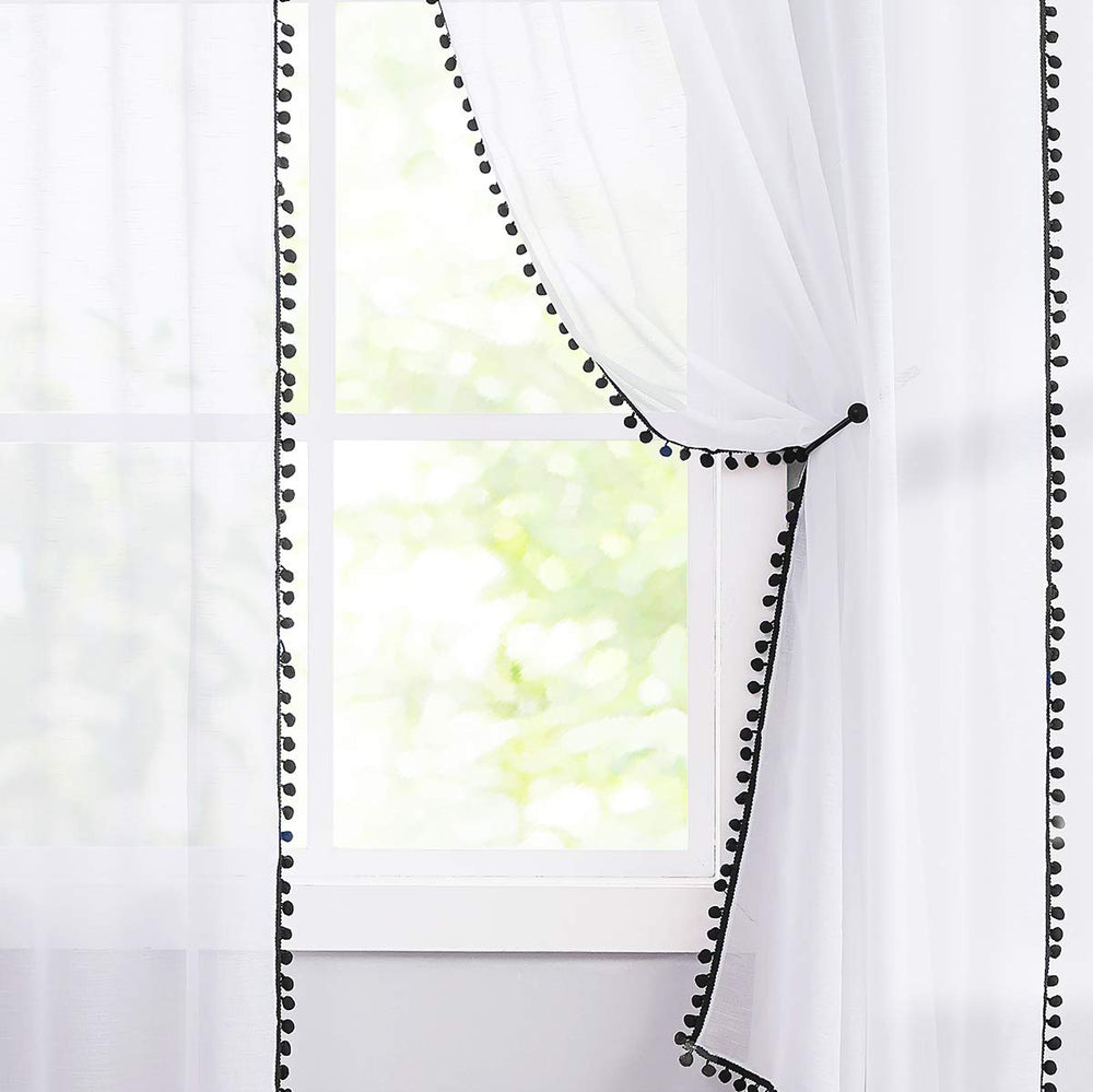 Treatmentex nursery room curtains diffuse light for a gentle, comfortable space.