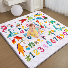 TreeBud Baby Play Mat featuring dinosaurs and letters for engaging tummy time play.