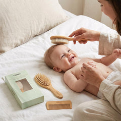 TRENFI goat bristle brush helps exfoliate dry scalp softly while distributing natural oils.