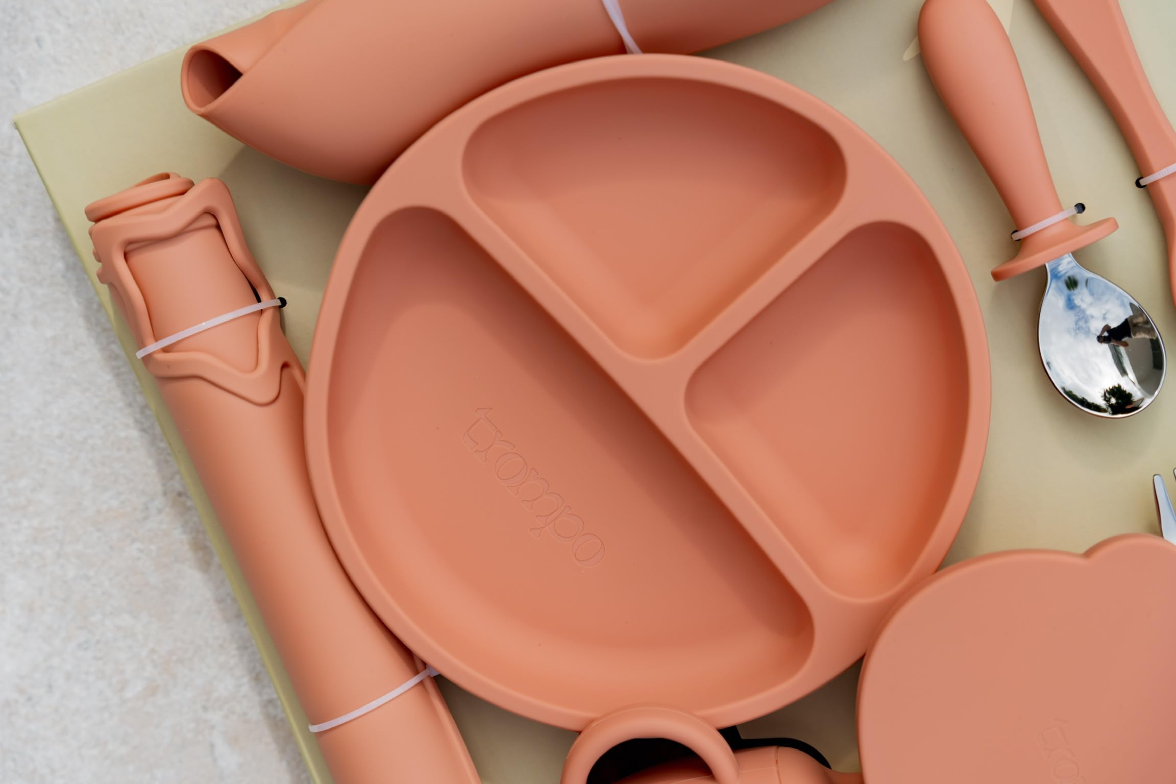 Trompo soft silicone utensils designed for safe baby meals.