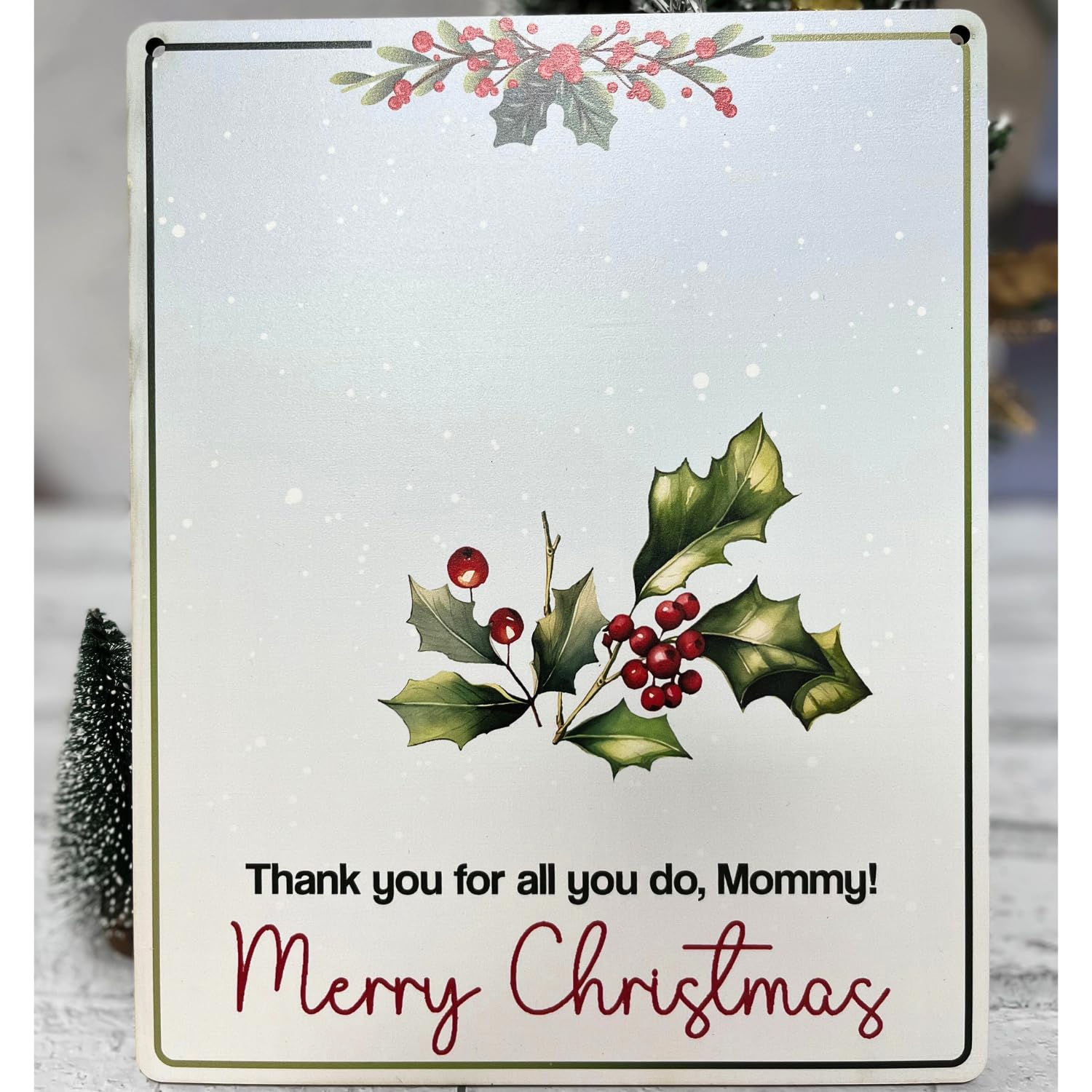 Trumpetic merry Christmas handprint art decor brightens walls, trees, or mantels with a personal touch.