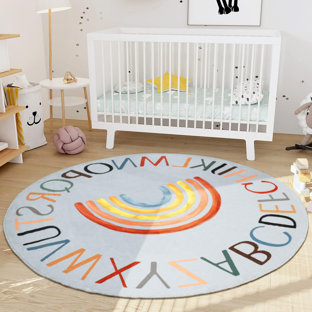 Truqual nursery rug round rainbow design with soft surface and non-slip backing.