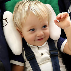 TRYTUTRY pillow attaches securely to car seat straps for stable naps during rides