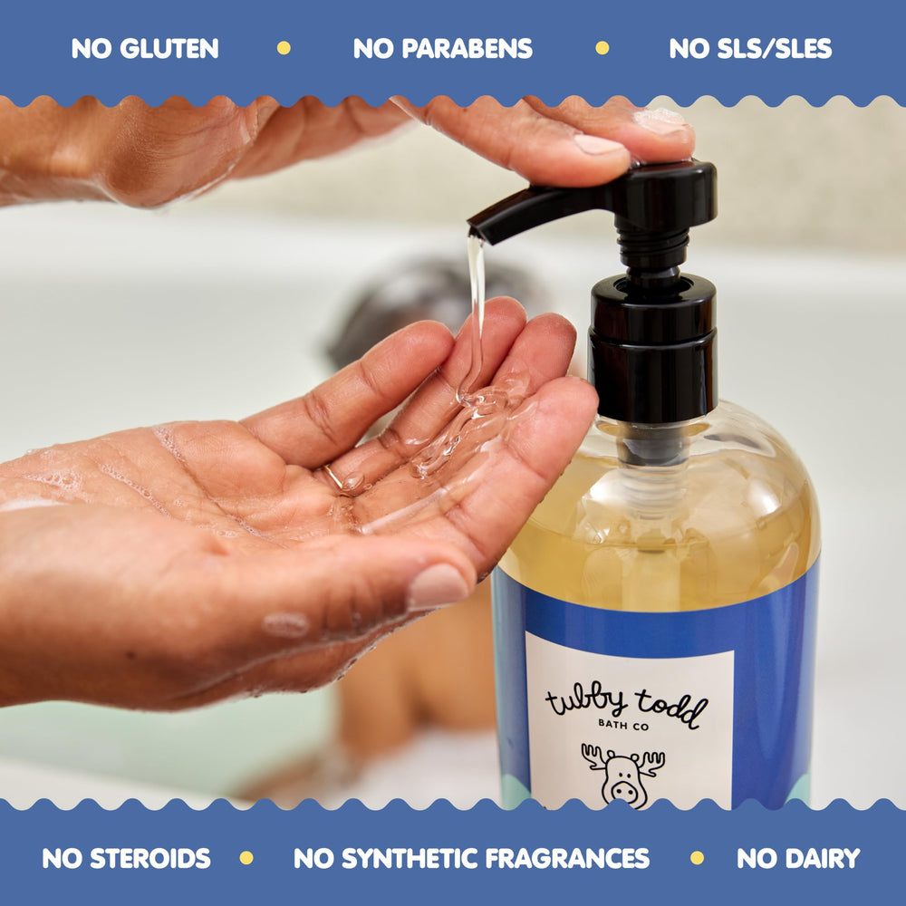 Baby enjoying bath time with lavender rosemary wash in scene.
