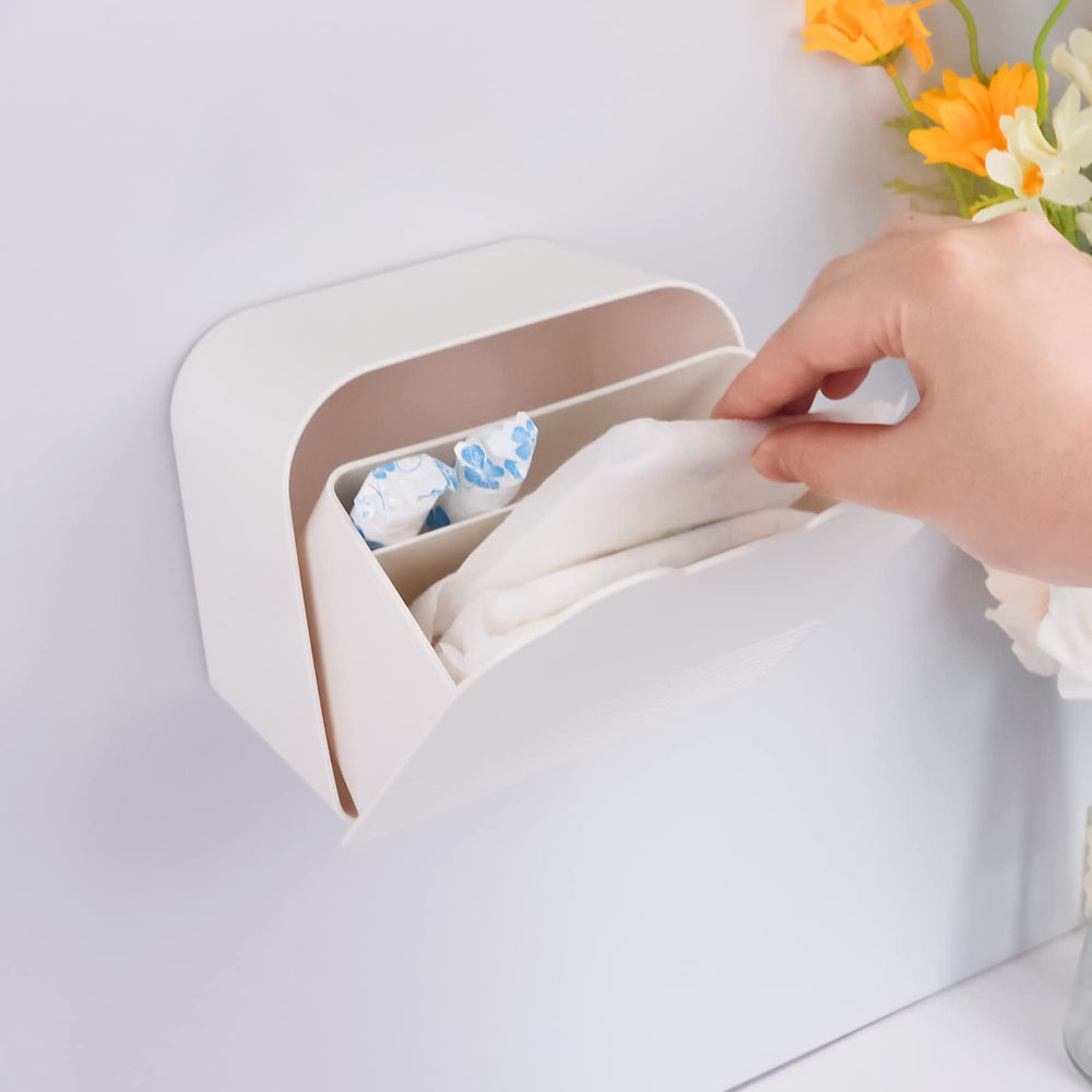 Two-compartment design holds napkins and tampons for tidy bathroom storage