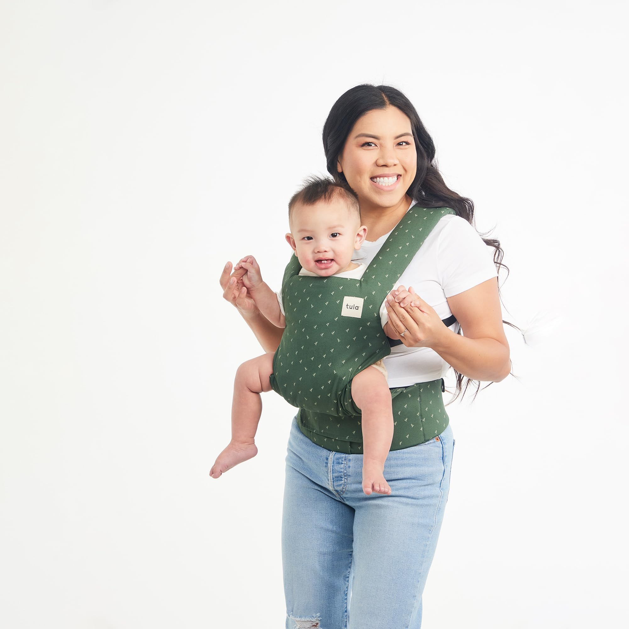 Tula Explore Carrier adjustable height and width fits growing wearers.