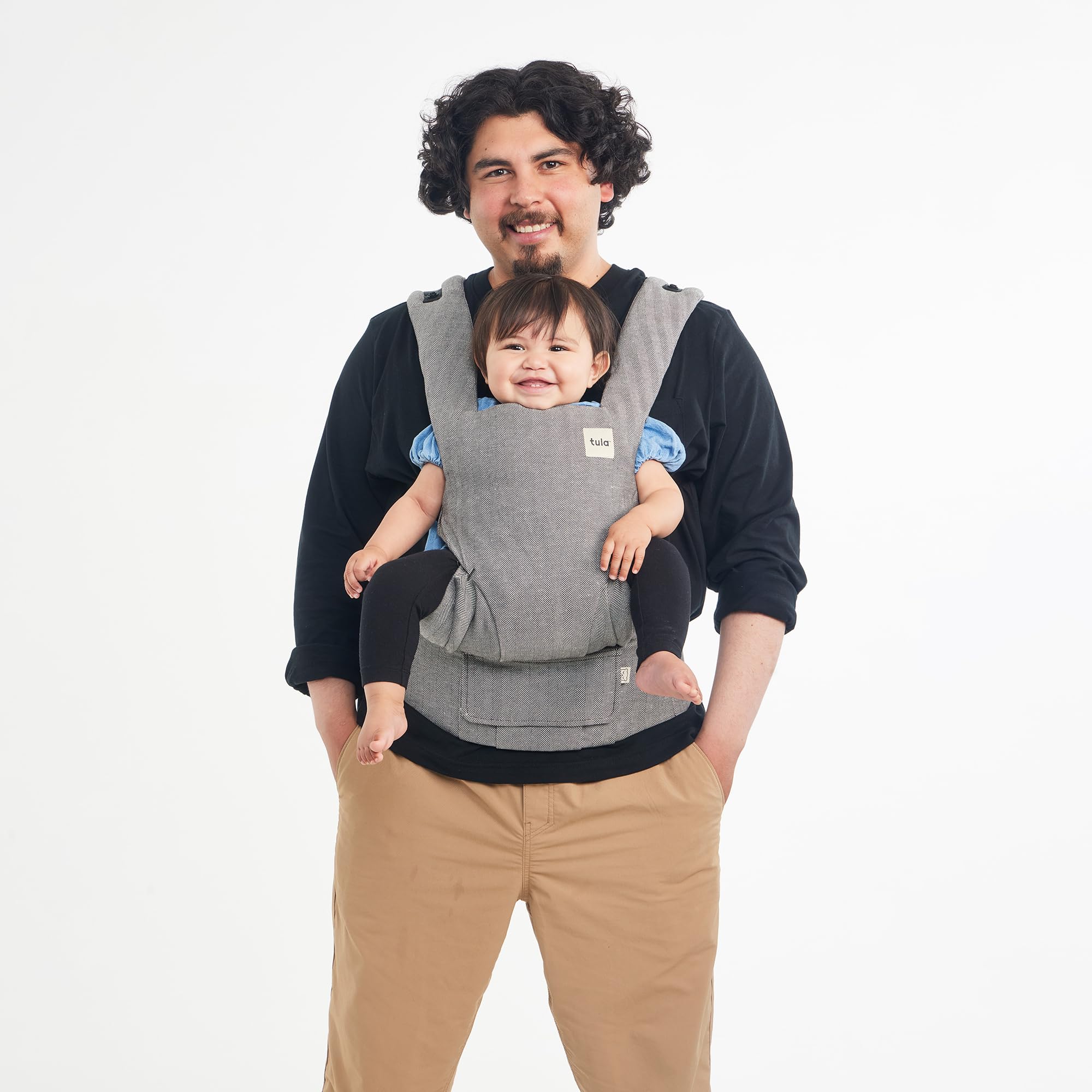 Tula Explore neck pillow keeps baby supported on outings.