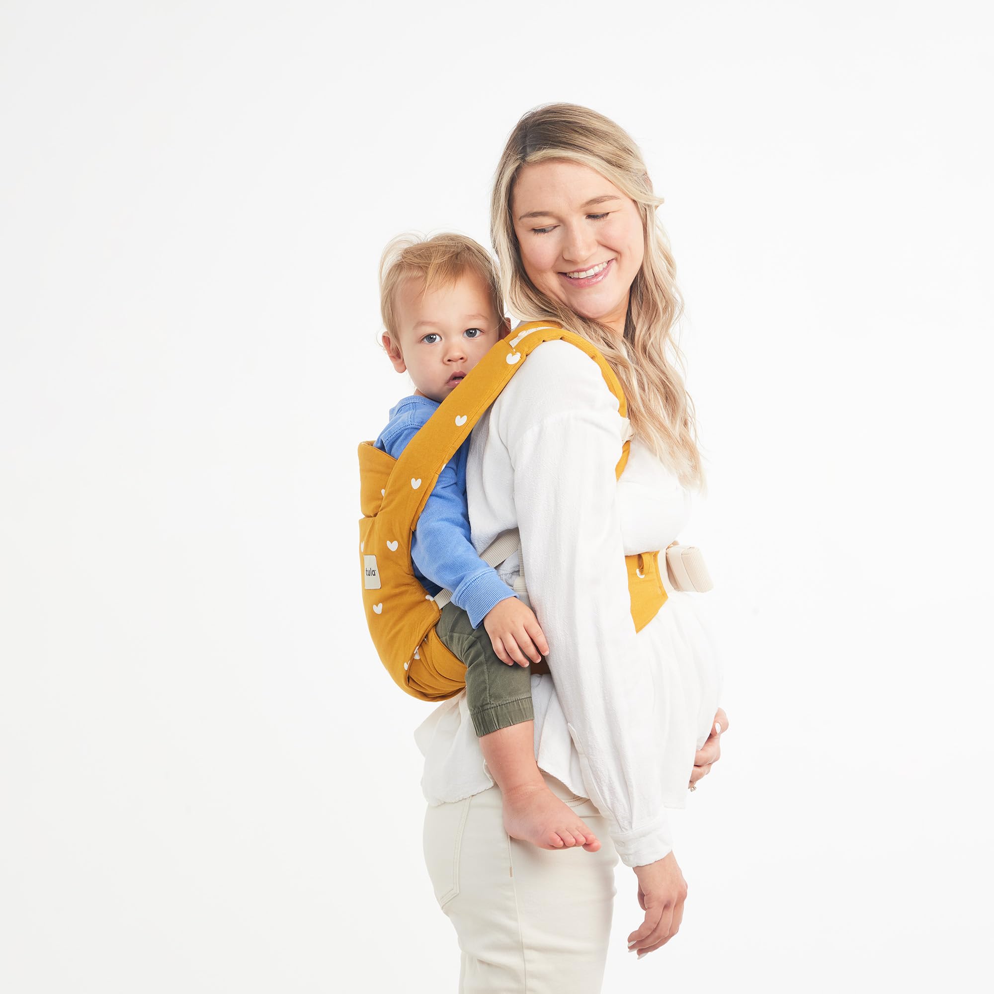 Tula Explore Carrier removable hood provides sun protection outdoors.