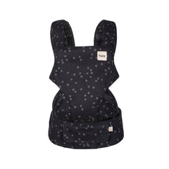 Tula Explore front carry shows ergonomic support for baby and caregiver in breathable cotton.