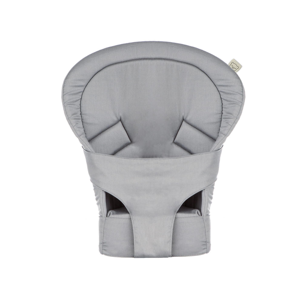 Tula infant insert supports newborns in front carry with head and neck support.