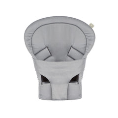 Tula infant insert supports newborns in front carry with head and neck support.