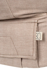 Tula Linen Toddler Carrier Sand — back view showing secure fit and weight distribution