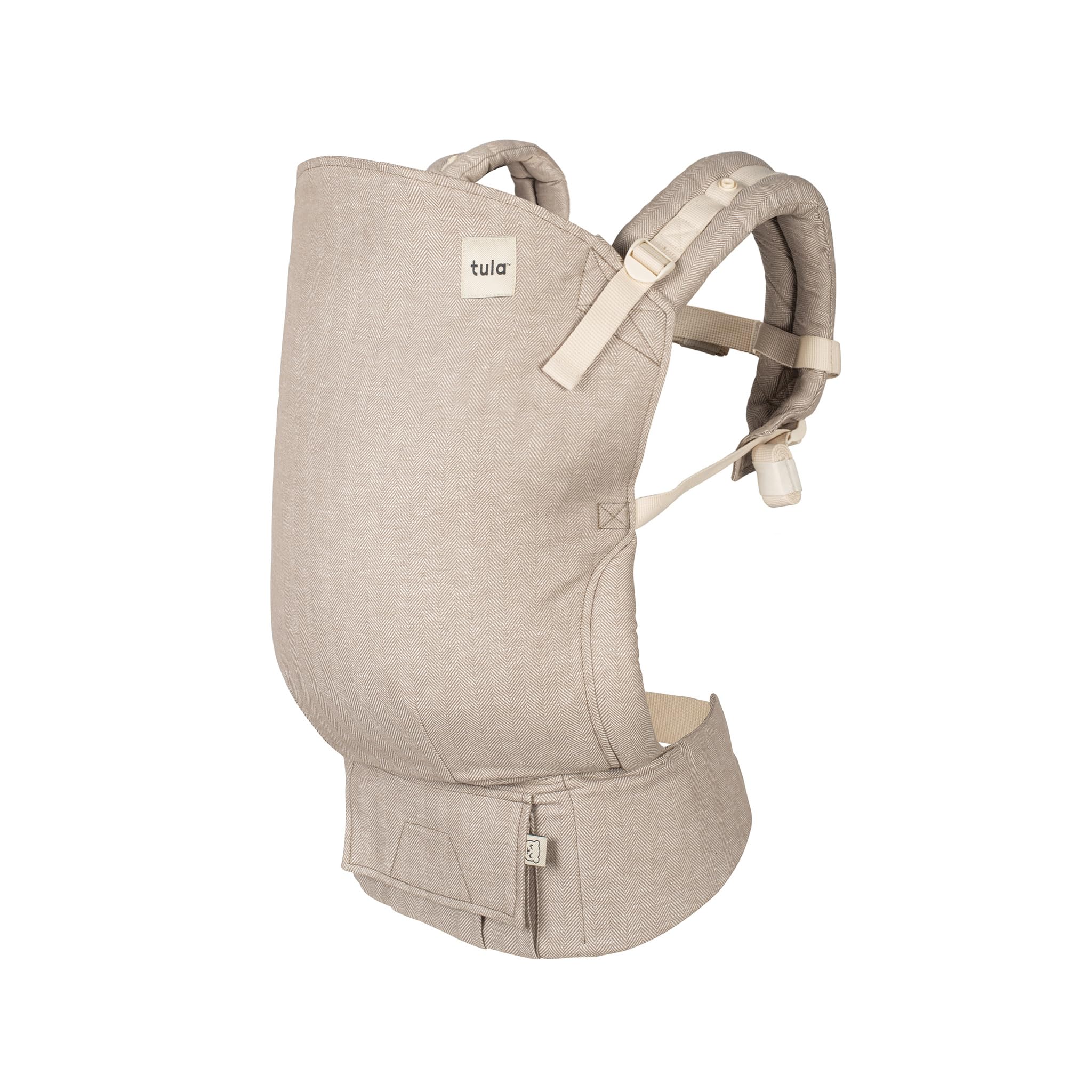 Tula Linen Toddler Carrier Sand — front view highlighting ergonomic seat and breathable fabric