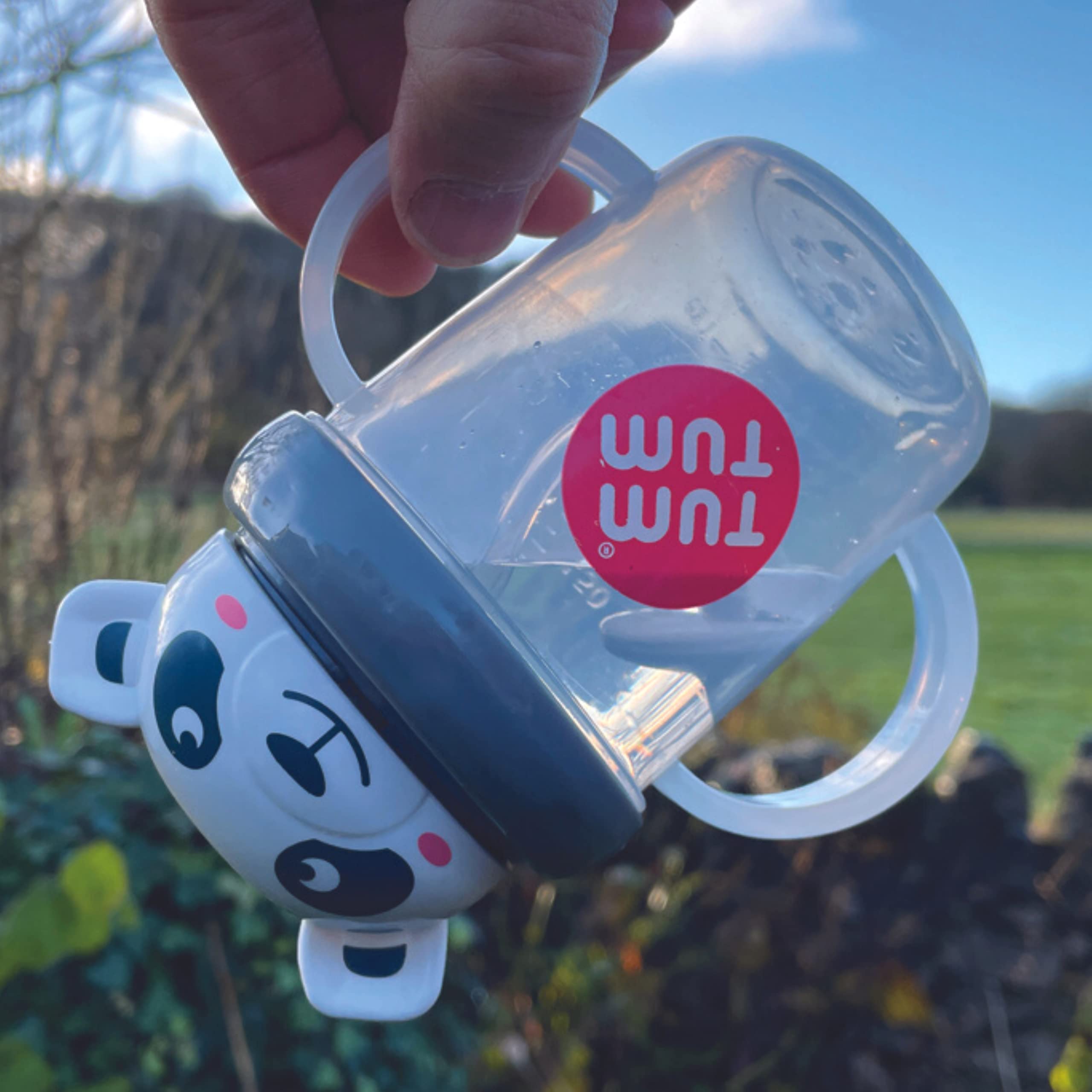 TUM TUM Pip Panda sippy cup with side measure to track intake.