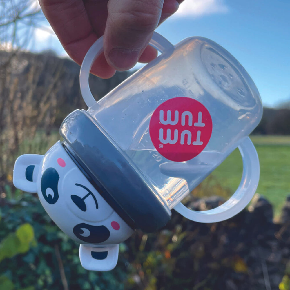 TUM TUM Pip Panda sippy cup with side measure to track intake.