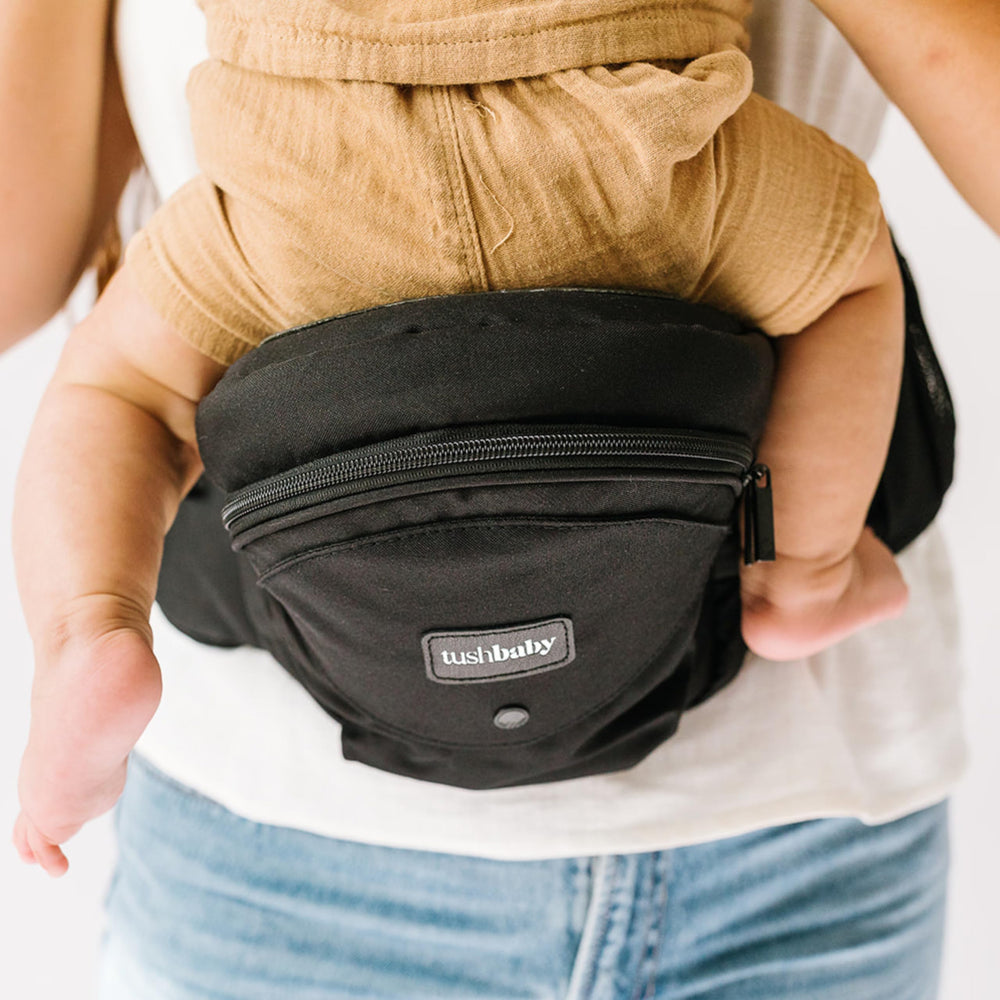 TushBaby nursing-pillow offers convenient feeding support on the move.