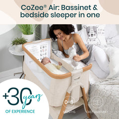 Tutti Bambini CoZee Air bassinet attached to bed for easy nighttime access.