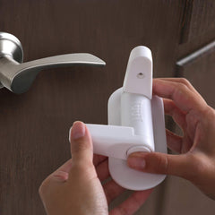 Tuut Door Lever Lock installed on a standard door lever for compatibility.