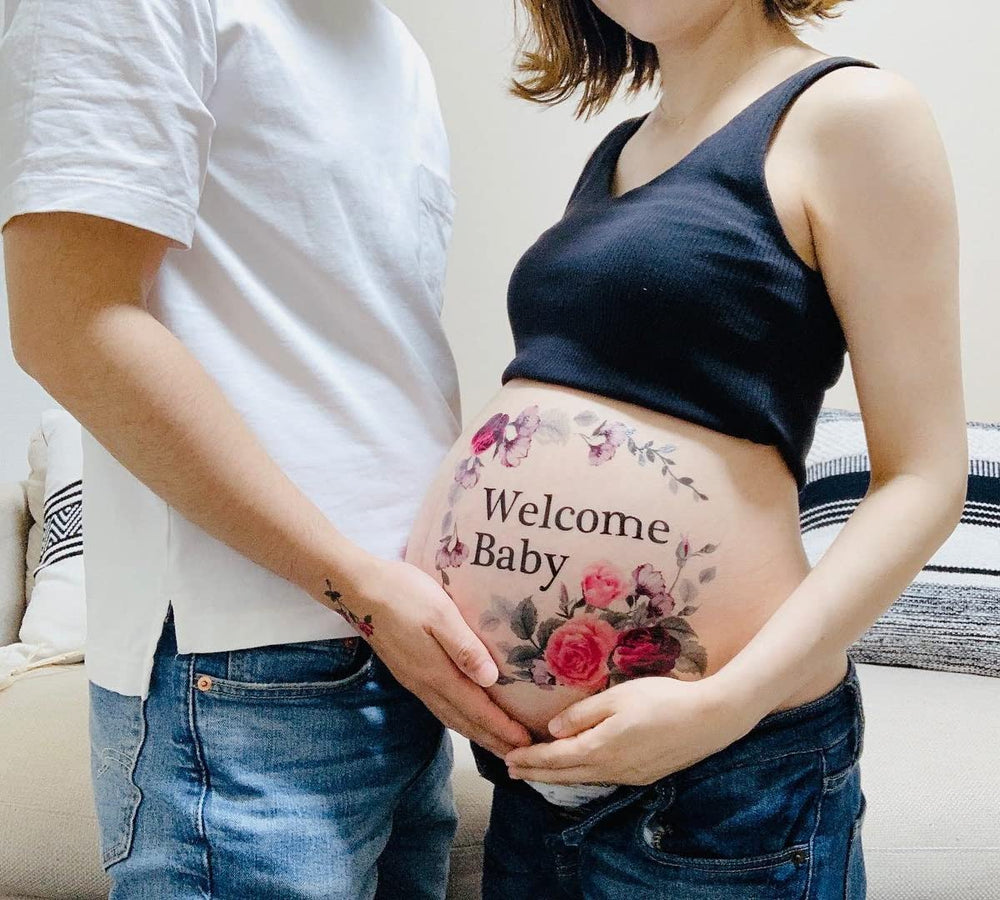 Tuzuru pregnancy belly sticker on a glowing bump for cute at-home photos